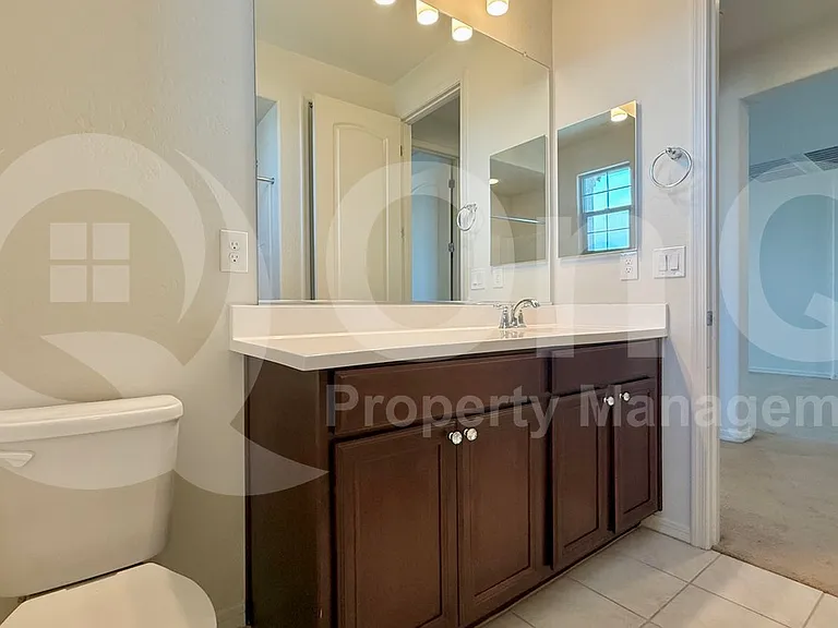 9707 W Patrick Ln — Photo 30