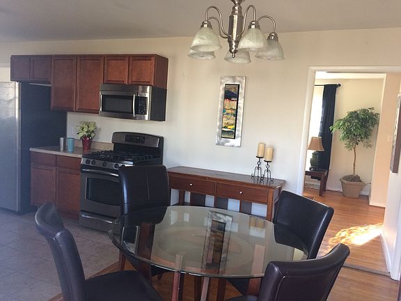dining room with sliding glass door to deck