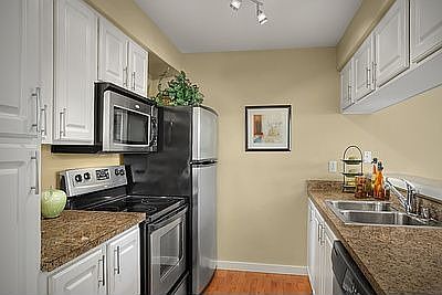 Kitchen features granite counters