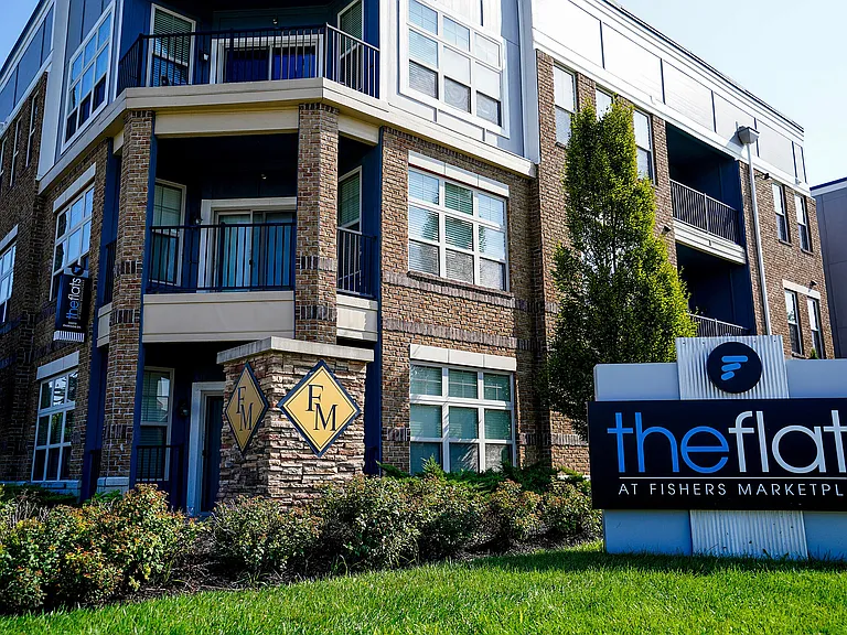 Welcome to The Flats at Fishers Marketplace. Modern design, walkable location, and seriously good curb appeal.