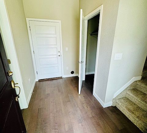 First floor, closet and door to two car garage.