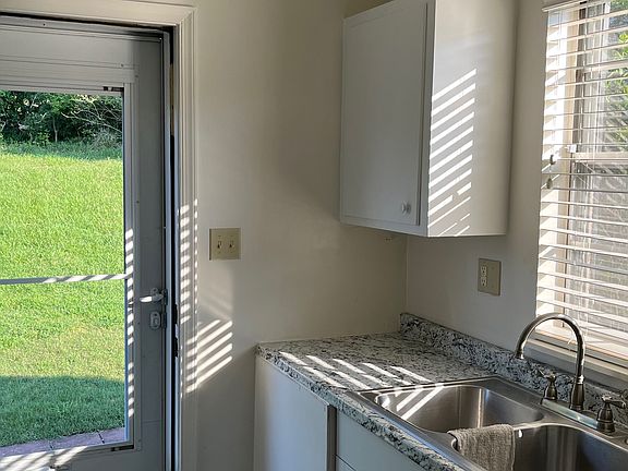 Kitchen with storm door