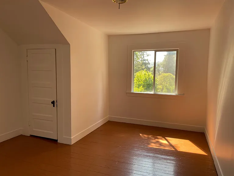 bedroom with hardwood floors