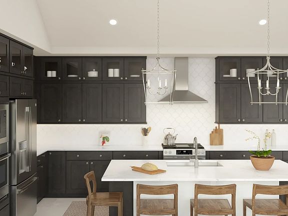 Kitchen with glass upper cabinets and pendant lighting