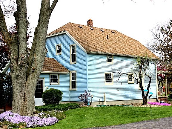 East Side of House & Entranc