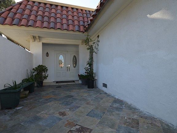 Front court yard with double door entry