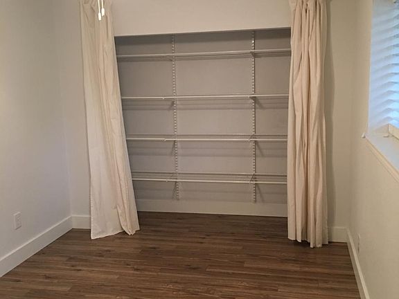 Guest bedroom with storage closet