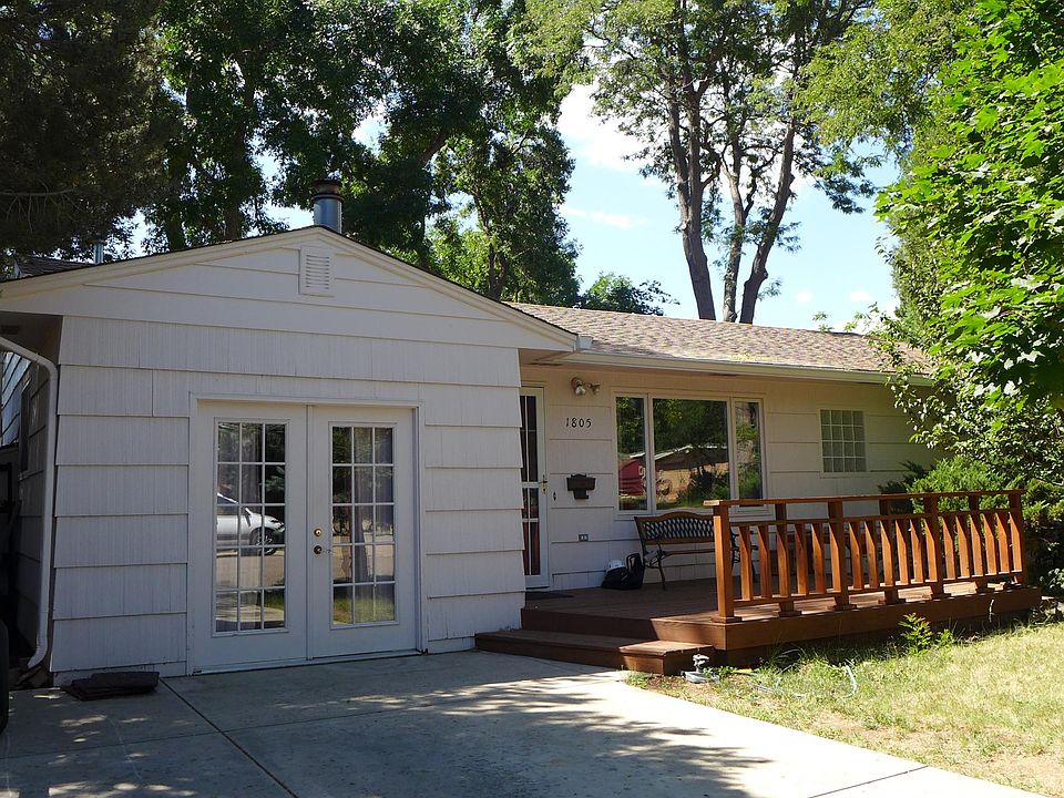 Welcoming home with front deck and off-street parking
