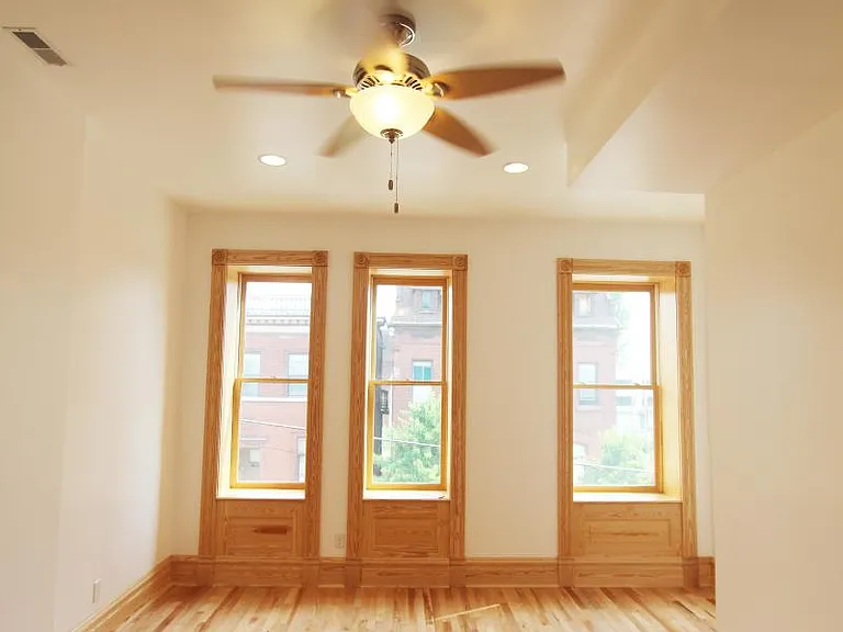 Family Room - beautiful hardwood floors, ceiling fan, 10' ceilings, energy-efficient lighting