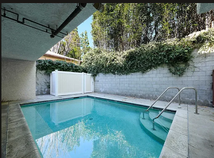 Pool and backyard of complex