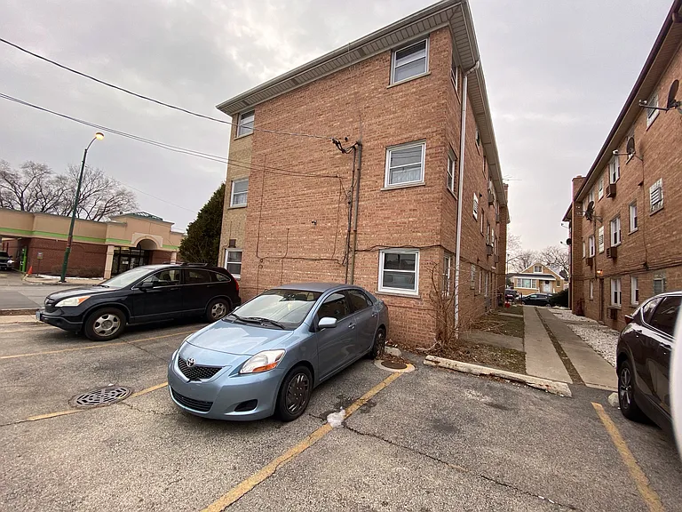 The parking area with 4 spots
