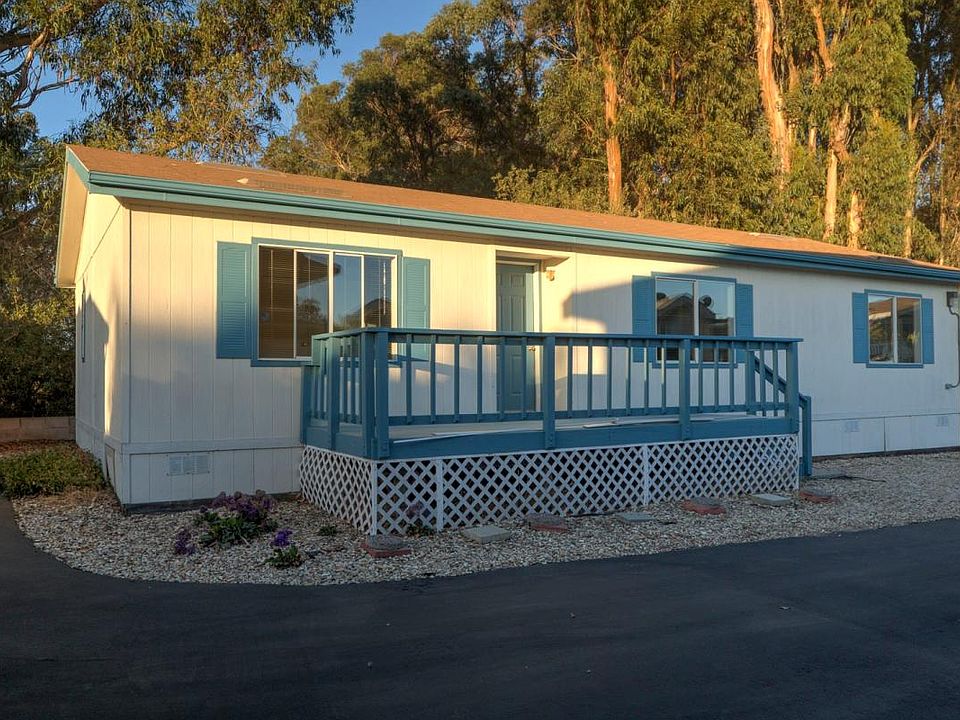 Exterior with Butterfly Grove behind home