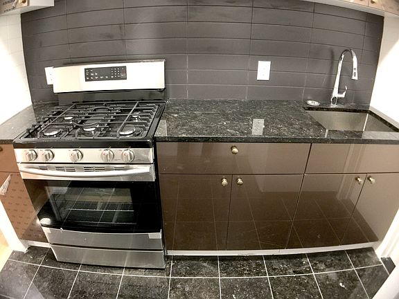 New kitchen, new stove+new cabinets+sink+fridge