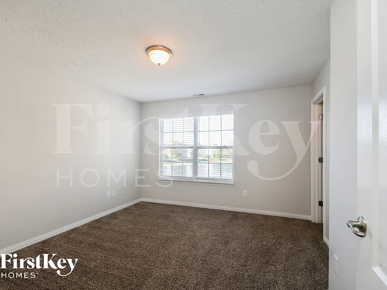 10871 Monarch Springs Ct — Photo 13