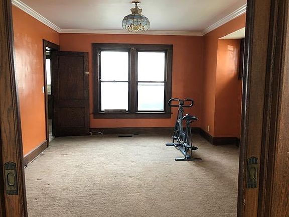 Dining Room off the Living Room. Bike will be removed.