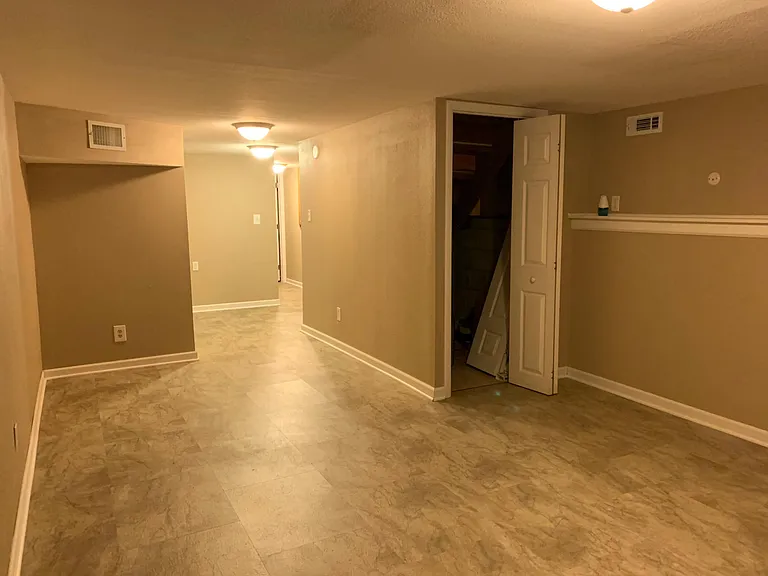 Basement family room, storage/office room and closet are down hallway