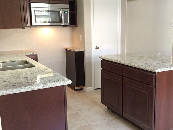 Brand new kitchen cabinets, granite, & stainless steel appli