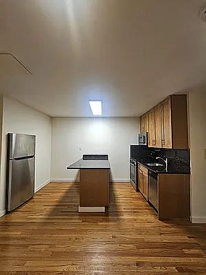 4th image of 25-23 33rd St Unit 1L