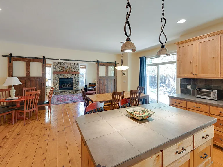 Kitchen island view into living room