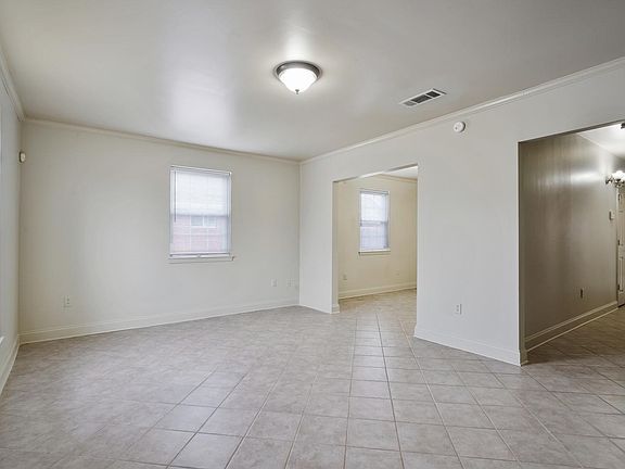 Living room opens to dining room.
