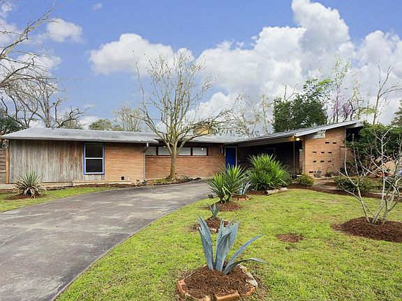 Pecky Cypress is used on the front exterior siding.