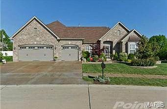 Lots of parking, three car garage, beautiful elevation.