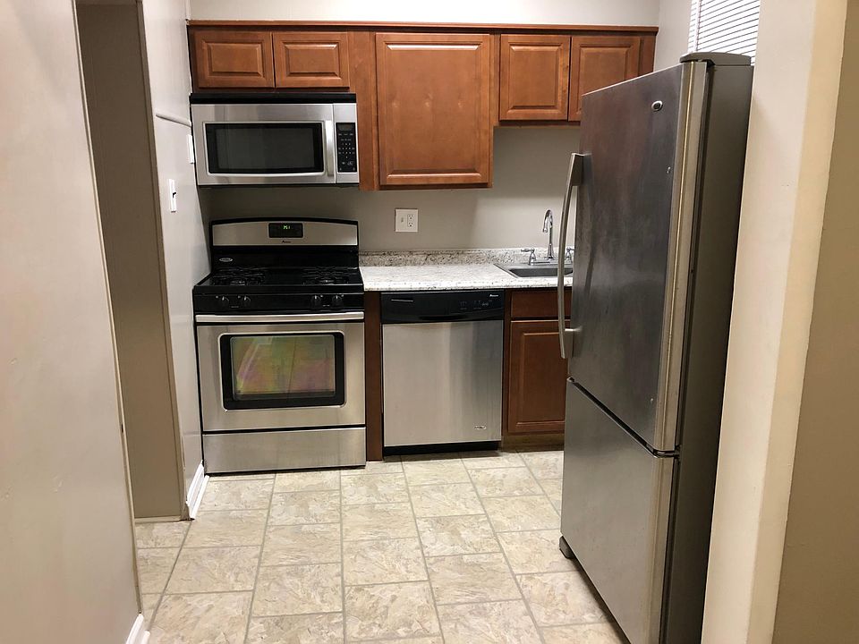 Full kitchen with stainless steel appliances