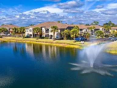 Immerse yourself in a lakeside paradise at Lakes of Tuscana's resort-style pool and enjoy breathtaking lake views while taking i