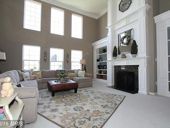 2 Story Family Room with Custom Built in Shelves
