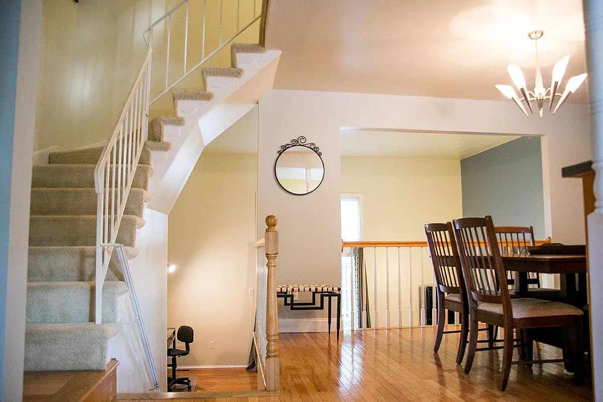 View as you enter - staged/prior to paint and recessed light in the family room - 2331 Harleyford Ct
