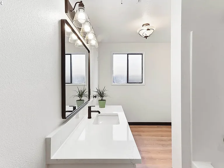 Upstairs bathroom with tub