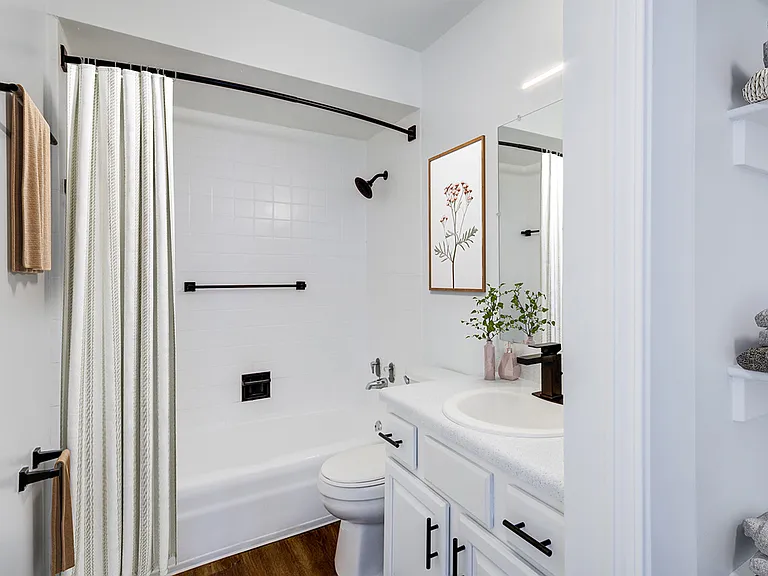 Experience luxury in this beautifully designed bathroom featuring elegant finishes and ample storage. Experience luxury in this beautifully designed bathroom featuring elegant finishes and ample storage.
