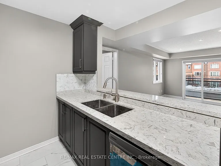5035 Oscar Peterson Blvd #105 — Photo 14