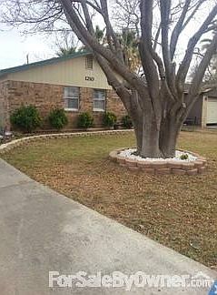 Front of House
						:
						Landscaped yard and flowerbeds; in ground sprinklers in front