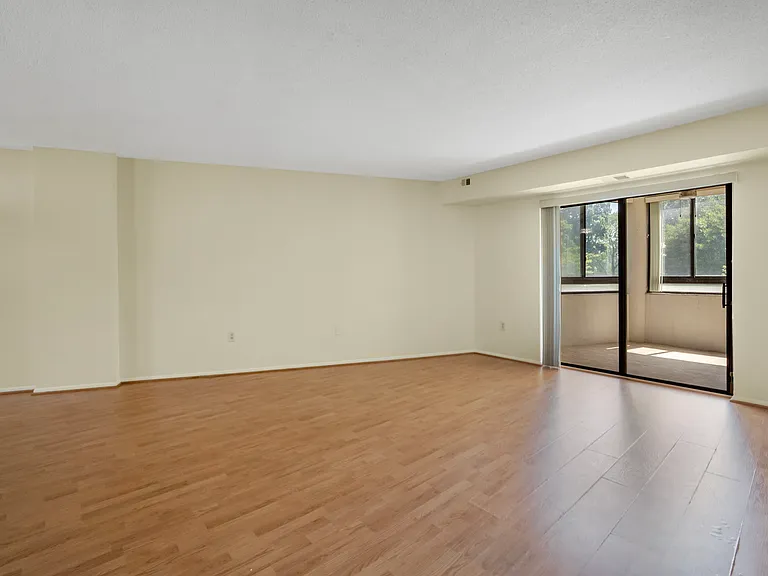 Living Area Opens to Enclosed Sunroom