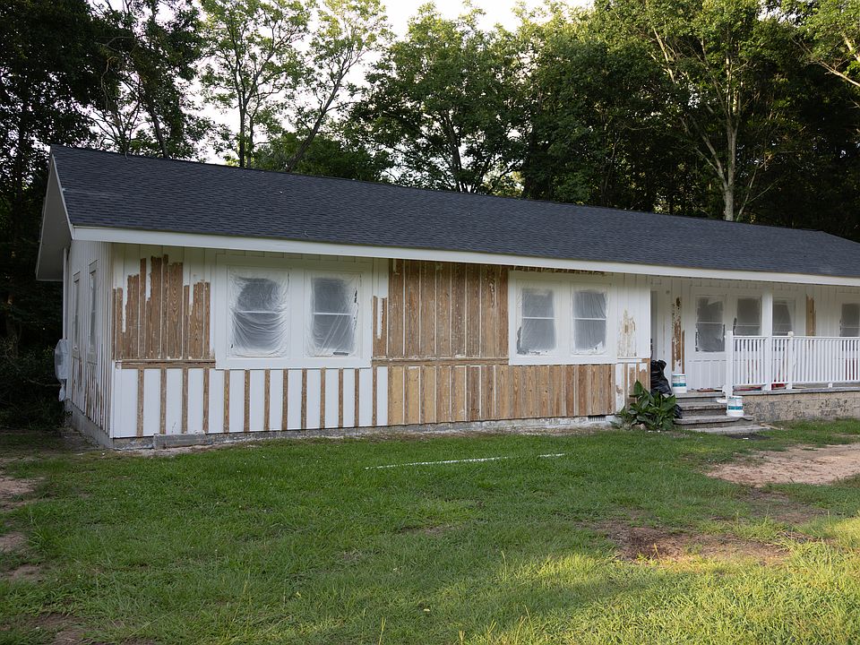 Front of house (obviously in the process of preparing to paint the outside)