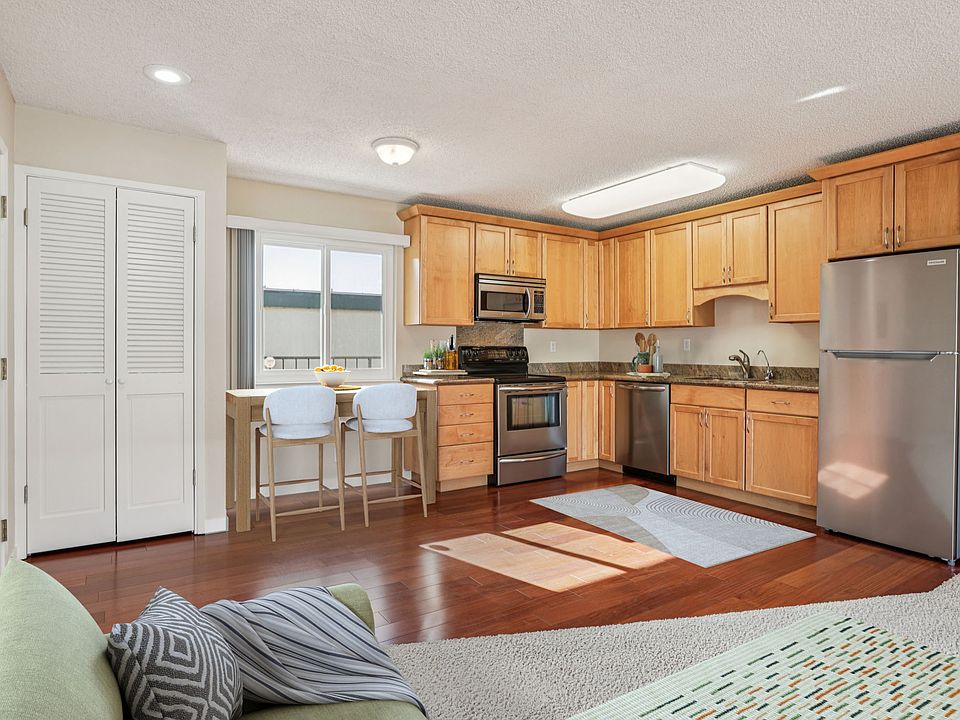 Kitchen with granite countertops and stainless steel appliances