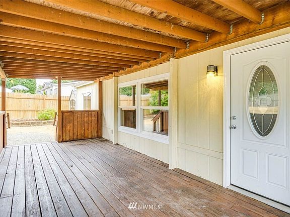 This porch faces South, very nice for giving shade to the house.  Nice to sit and relax in the evening.