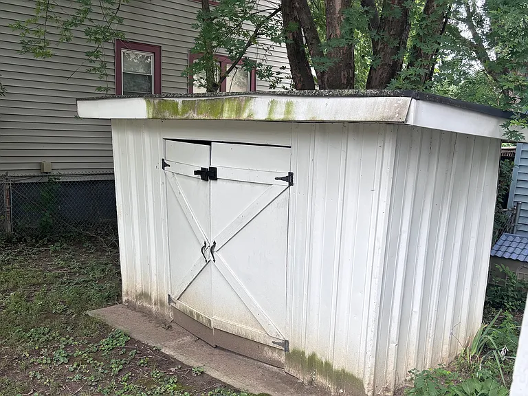 Private shed for extra storage. There is also storage in the basement - the basement storage is shared with unit 2.
