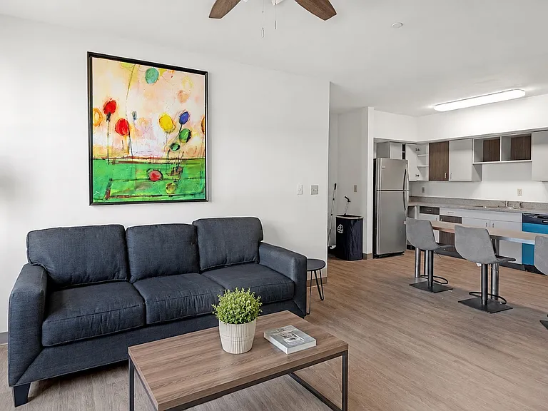 Open layout, spacious living area that opens to kitchen