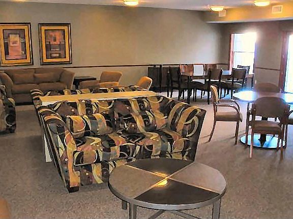 Large party room with kitchen and deck.