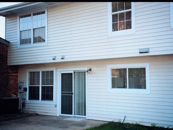 Back of house from fenced yard
