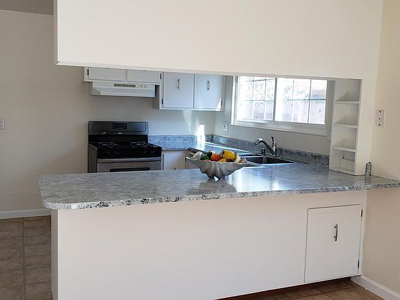 Kitchen -Counters have plenty of depth offering an eating/bar stools on the back side.
