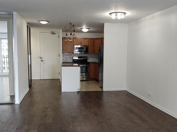 Living space - entryway, kitchen, dining space