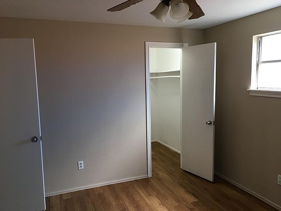Bedroom with walk-in closet