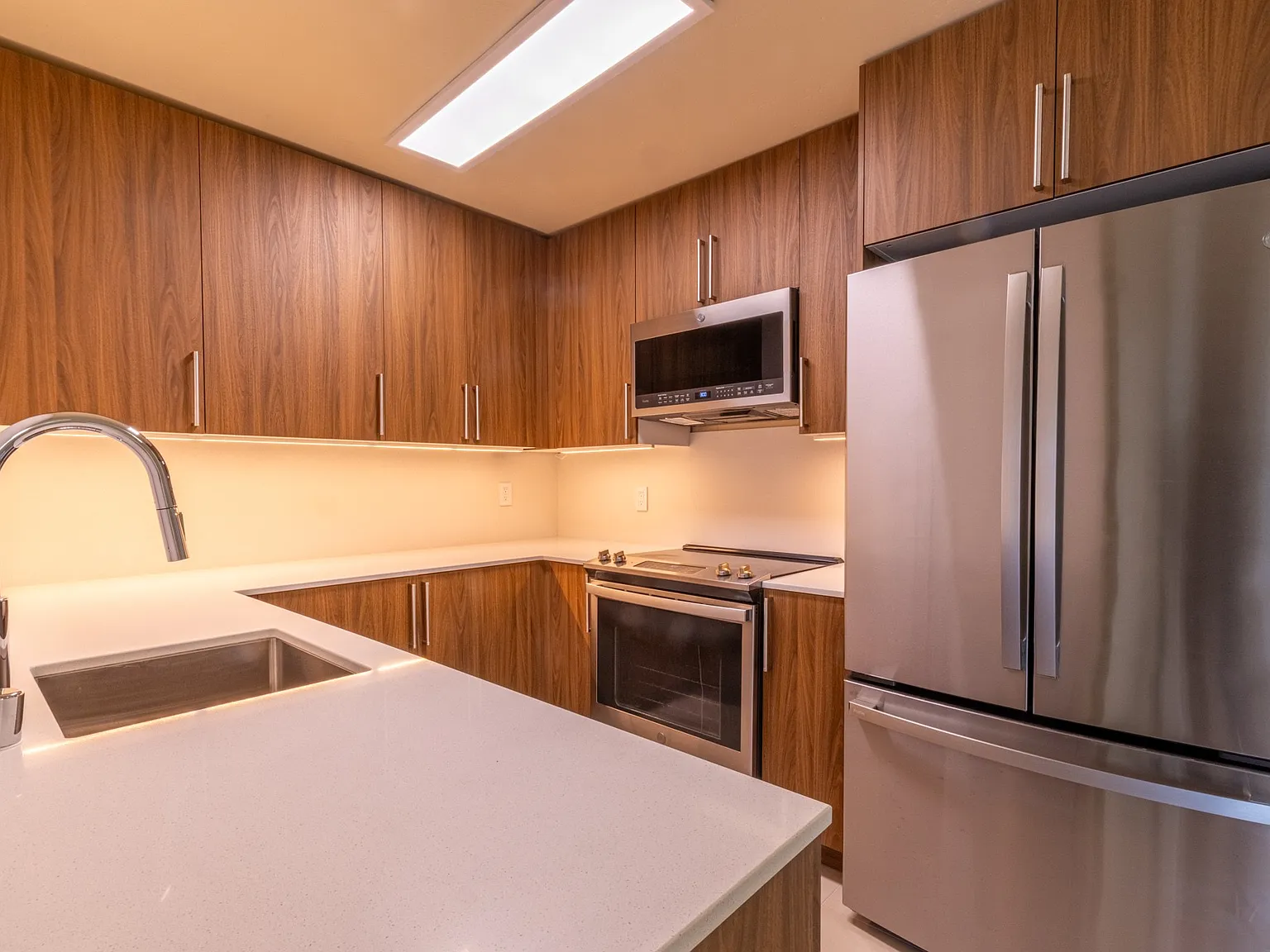 Bright, functional kitchen with modern finishes and smart storage.