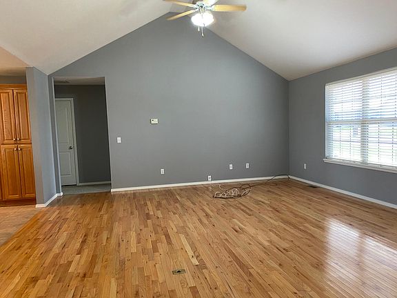 Real hardwood floors and vaulted ceiling