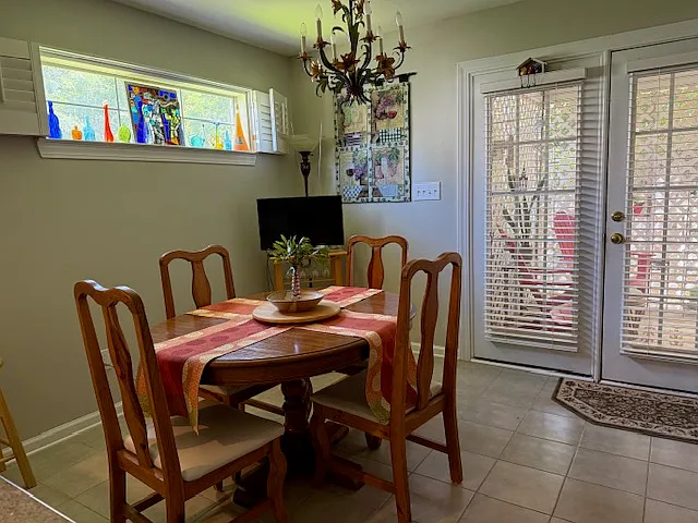 Dining area with French door to the screened porch