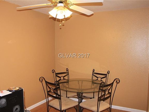 Dining Area View with Ceiling Fan and Light