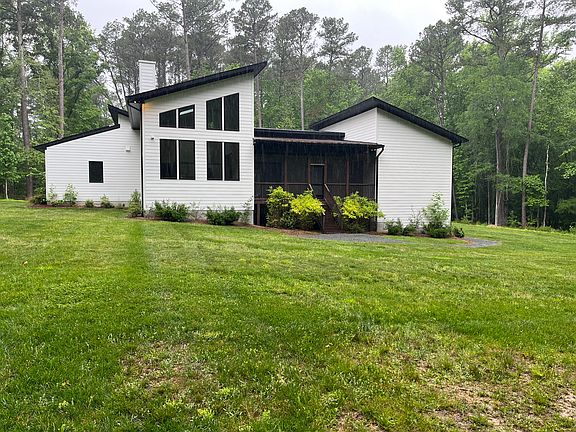 Backyard view towards home, full screen porch